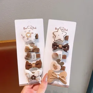 Joli ensemble de pinces à cheveux en tricot écossais pour filles, détails nœud et fleur.