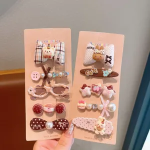 Cute cartoon hair clip set detail view, featuring adorable resin bear and bow designs.