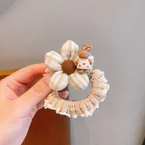 Cute plaid lace hair scrunchie featuring lovely rabbit charm and soft fabric for women.