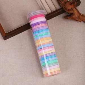 Colorful elastic hair ties set in a clear storage tube, stretchy hair bands for women and girls.