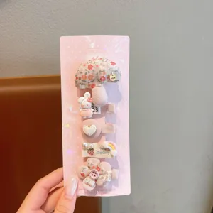 Cute cartoon kids hair clips set, sweet fabric side hairpins for girls daily wear and styling.