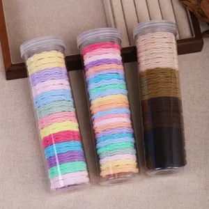 Colorful hair ties in clear storage tubes set of three stretchy elastic hair bands for women