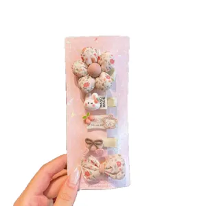 Cute cartoon hair clip set for kids, sweet floral fabric side hairpins, safe and gentle for girls.