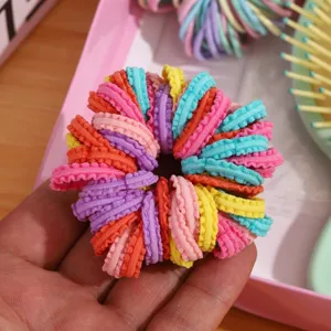 Colorful elastic hair ties set for kids, cute multicolored scrunchies for daily hairstyling.