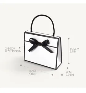 Minimalist black and white gift box with bow handle, elegant packaging bag for present