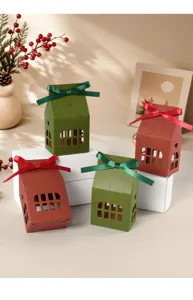 Christmas house shaped gift boxes with bow and hollow windows, perfect for holiday candy and treats.