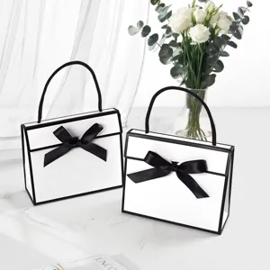 Minimalist Black And White Contrast Bow Handbag Folding Gift Box High End Decorative Gift Wrapping Bag For Party