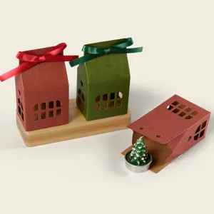 Christmas house gift boxes with ribbons, wooden base and candle set for holiday decor