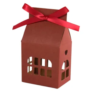 Christmas house shaped gift box with red ribbon bow, paper candy container front main view.