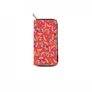 Detail shot of long PU zip wallet with colorful butterfly print and gold zipper pull.