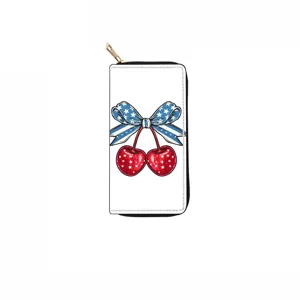 Long zipper wallet featuring cute cherry and patriotic bow print, spacious clutch purse design.