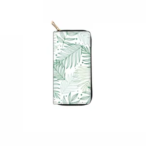 Close-up detail of the long PU leather zip wallet featuring a stylish green botanical leaf print.