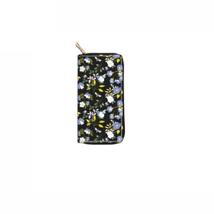 Detailed view of the floral print long zipper wallet featuring a sleek black finish and gold pull.