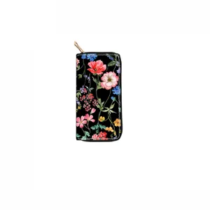 Long zippered wallet featuring vibrant watercolor floral print on black background with gold pull.