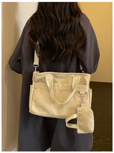Sac bandoulière en toile décontracté coréen pour femme avec sangle et mini poche.