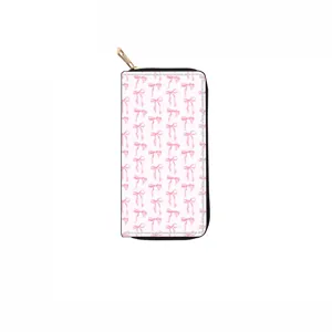 Chic long zippered wallet featuring a sweet pink bow pattern on white. Stylish clutch purse.