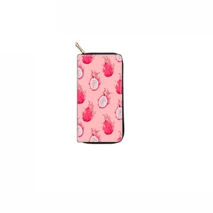 Long zippered wallet with pink dragon fruit print detail view showing pattern and zipper structure.