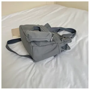 Sac cabas en toile décontracté et sac à bandoulière avec sangle croisée et petite pochette quotidienne.