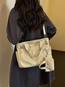 Sac bandoulière en toile décontracté et polyvalent style coréen avec mini poche femme.