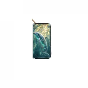 Detailed view of long zipper wallet featuring vibrant ocean dolphin print and metallic pull.