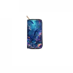 Detailed view of the long zipper wallet featuring a vibrant ocean dolphin and coral reef print.