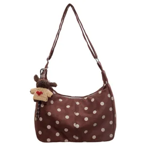 Brown polka dot suede shoulder bag with cute fuzzy monkey pendant, casual daily hobo bag.
