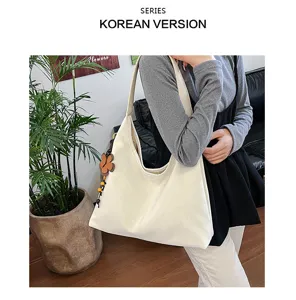 Minimalistische, große Damen-Leder-Umhängetasche, stilvolle Freizeittasche für den Pendelverkehr.