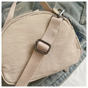 Casual nylon shell crossbody bag, daily shoulder bag with adjustable strap and durable hardware.