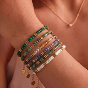 Layered natural stone beaded bracelet set with gold spacers and cute heart charms chic jewelry.