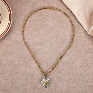 Stainless steel heart lock necklace for women, stylish gold and silver two-tone pendant jewelry.