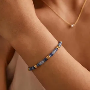 Elegant natural stone beaded bracelet with gold spacers, perfect for daily fashion wear.