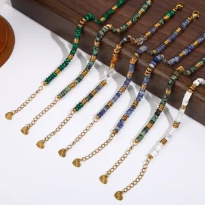 Close-up detail of colorful natural stone beaded bracelets with stainless steel spacers.