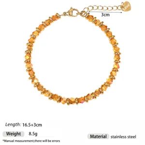Gold crystal beaded bracelet with extension chain, stylish stainless steel jewelry for women.