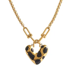 Stainless steel heart pendant necklace for women, stylish gold-plated chunky chain jewelry.