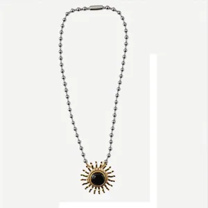 Collana con ciondolo sole in acciaio inossidabile e pietra nera bicolore oro argento