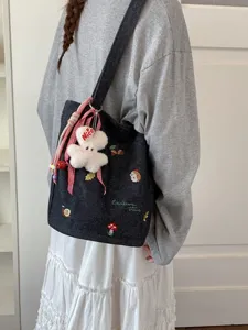 Süße minimalistische große Jeans-Umhängetasche mit Stickerei und Plüschanhänger Damen.