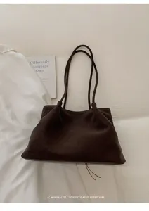 Korean minimalist dark brown tote bag, large capacity soft leather single shoulder bag.