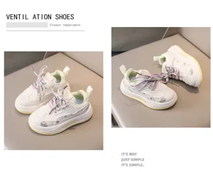 Children casual sneakers detail view, white sport shoes with colorful laces and cute whale print.