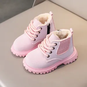 Pink kids plush winter boots detail view, warm fuzzy lining and thick non-slip rubber sole.