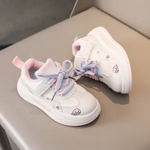 Kids casual sports shoes with cute whale print, soft sole and convenient velcro design.