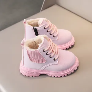 Pink kids winter boots with plush lining, side zipper and anti-slip thick sole for toddlers.