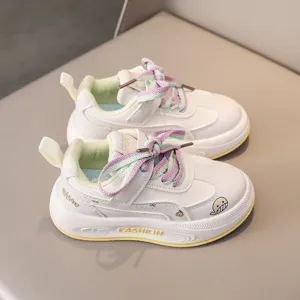 Kids casual white sneakers with cute whale graphics, velcro strap and colorful laces.
