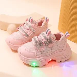 Pink light-up kids sneakers with sparkling rhinestones and cute bowknot for girls walking