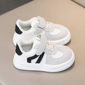 Kids casual sneakers detail view, breathable and non-slip white grey board shoes for spring.