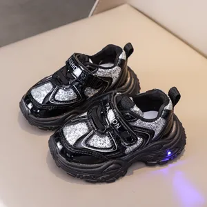 Children's glowing sneakers with glitter patchwork, comfortable hook and loop strap design.