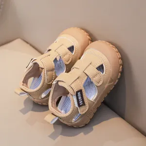Close-up detail of kids summer anti-collision soft sole toddler sandals with velcro strap.