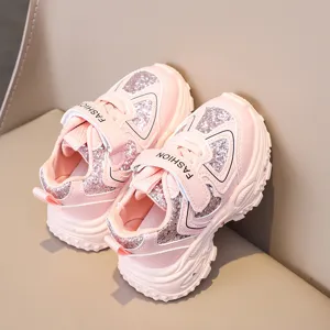 Kids pink glitter sneakers detail view, breathable mesh upper, comfy soft sole and velcro closure.