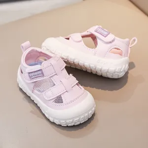 Cute pink toddler sandals with velcro, breathable hollow design and soft anti-slip sole for summer.