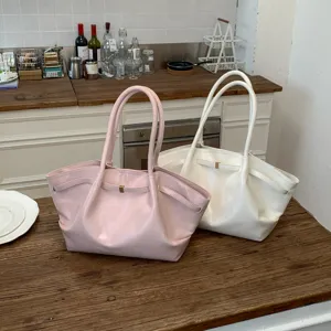 Élégant grand sac cabas épaule pour femme avec double poignées en options rose et blanc.
