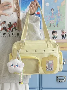 Large capacity yellow canvas ita bag tote shoulder bag with clear window and plush pendant.